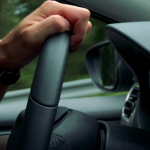 Man drives a car 150x150